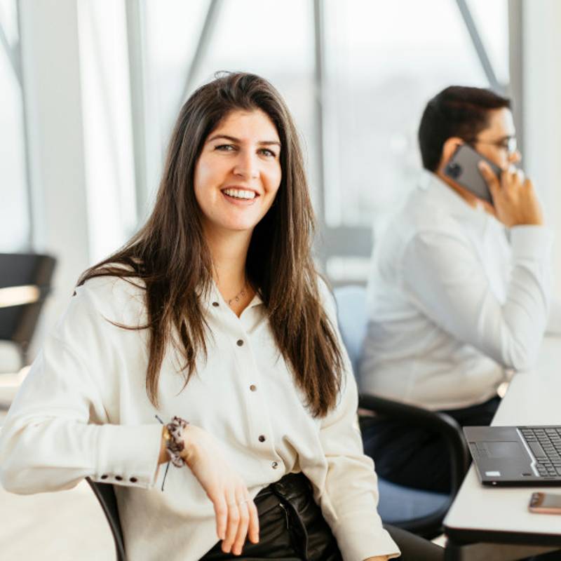 woman and man in office