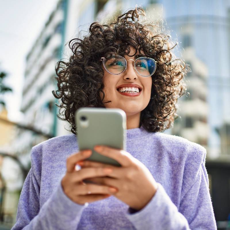 Lady in purple jumper on phone