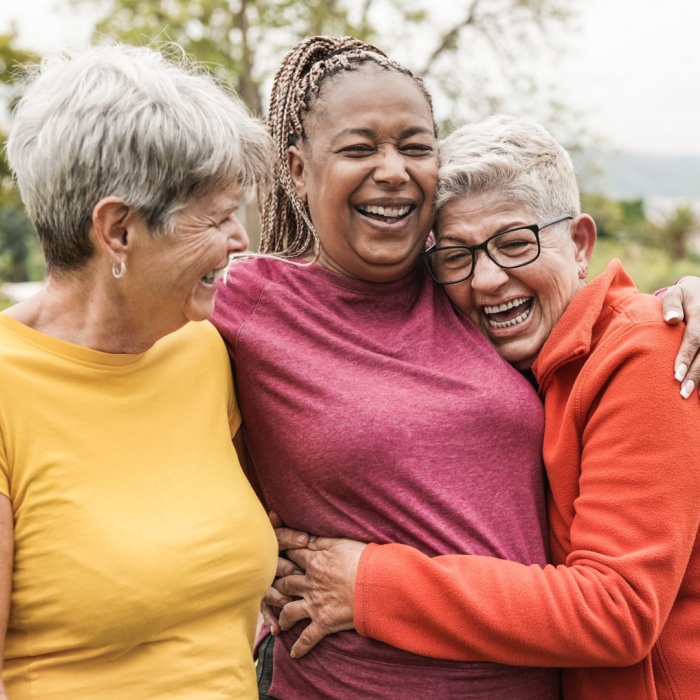 three woman hugging