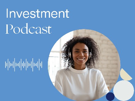 woman with headphones listening to Zurich investment podcast
