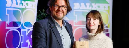 Neil Freshwater from Zurich presenting Sally Rooney with Novel of the Year at the Dalkey Literary Awards