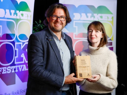Neil Freshwater from Zurich presenting Sally Rooney with Novel of the Year at the Dalkey Literary Awards