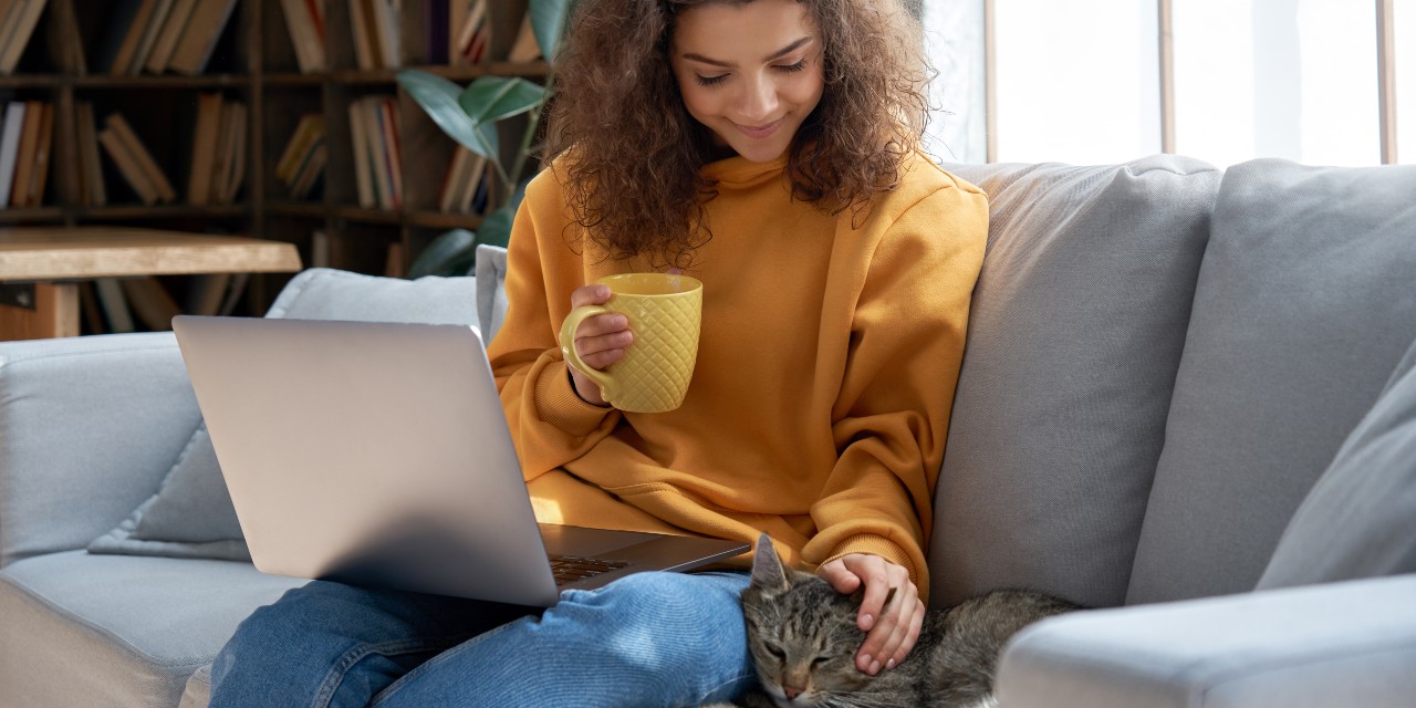woman at home with cat
