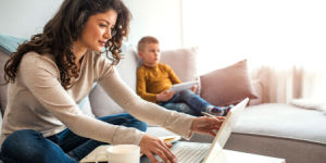 woman at home on tablet