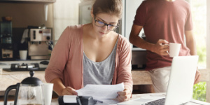 couple at home doing finances
