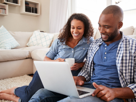 couple at home on laptop