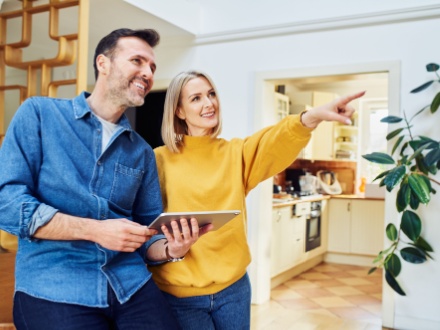 couple at home decorating