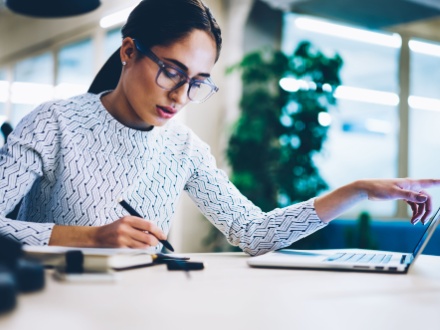 young asian woman on laptop