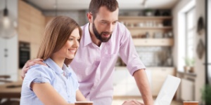 couple at home doing finances