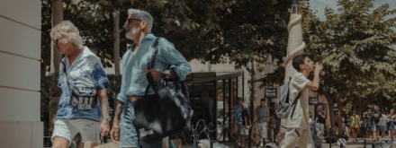 Couple in the early sixties with shopping bags in Barcelona