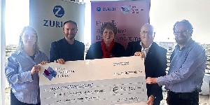 Down Syndrome Ireland receiving a charity cheque from Zurich