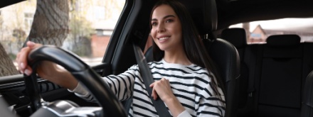 woman driving car wit seat belt on