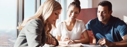 female financial advisor advising a couple