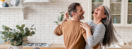 couple dancing at home