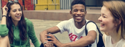 three young teenagers having fun