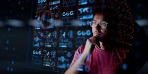 man looking at dashboard graphics