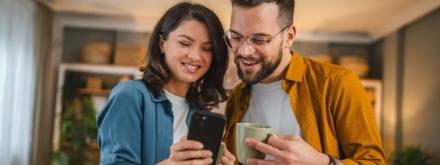 young couple on phone