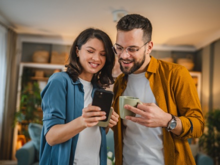 young couple on phone