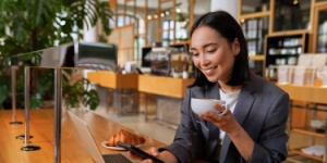 Woman in coffee shop on phone