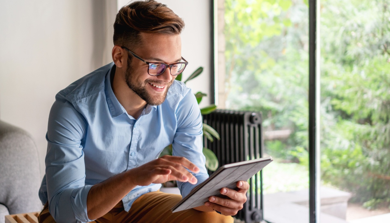 young man on digital tablet