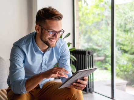 young man on digital tablet