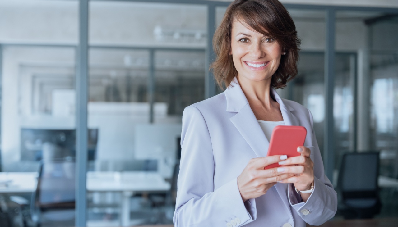 smiling woman on phone