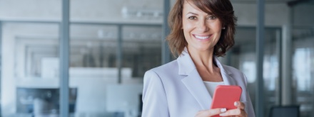 smiling woman on phone