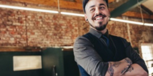 man in barber with tattoos