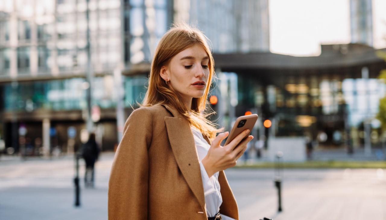 young business woman on phone in the city