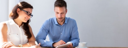 two work colleagues having coffee together