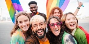 Selfie portrait of a group of lgbt mixed friends celebrating the gay pride parade