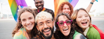 Selfie portrait of a group of lgbt mixed friends celebrating the gay pride parade