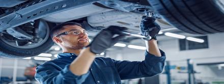 mechanic working in car