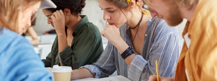 a group of diverse students studying together