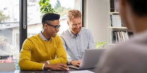 male couple getting financial advice