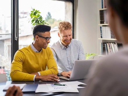 male couple getting financial advice