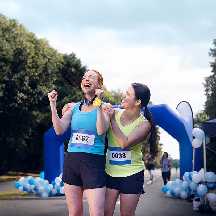 Two runners at the end of a race