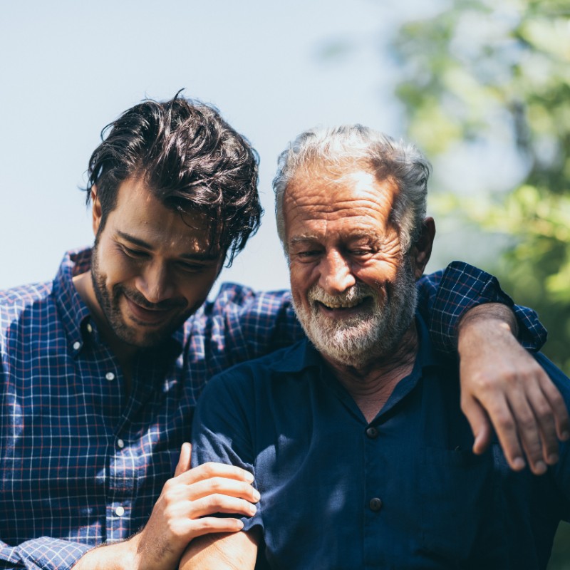 father and son hugging