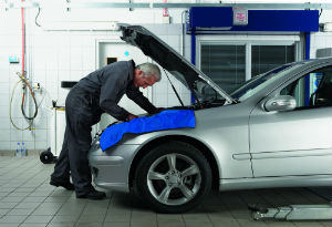 mechanic fixing a car