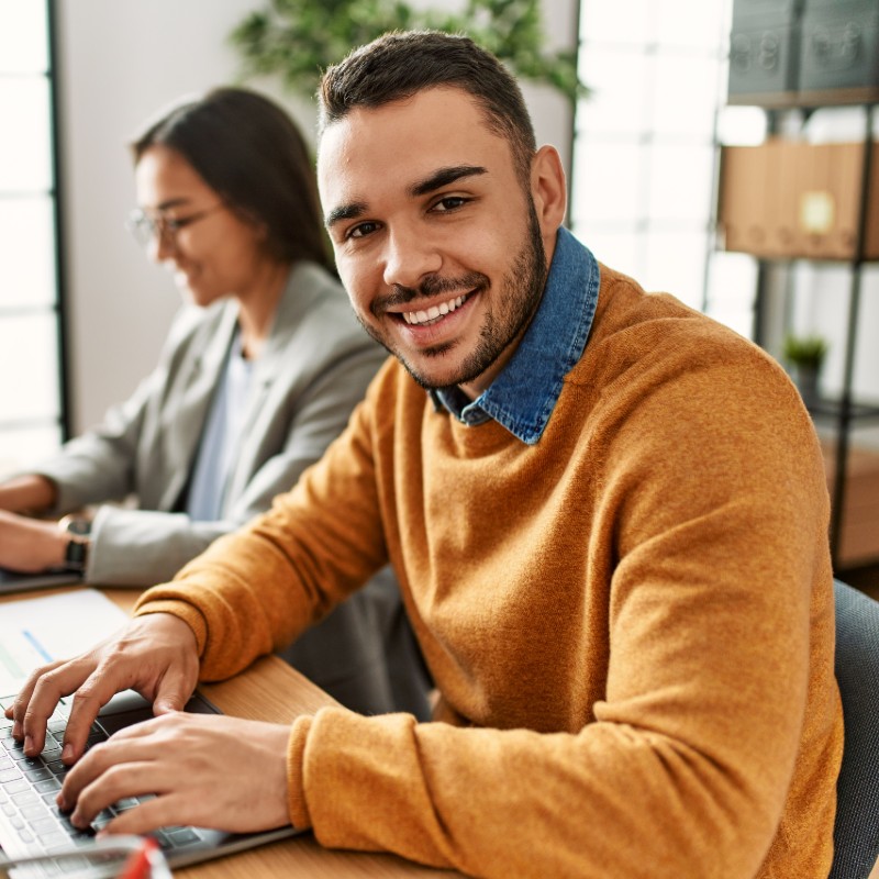 male office worker on laptop