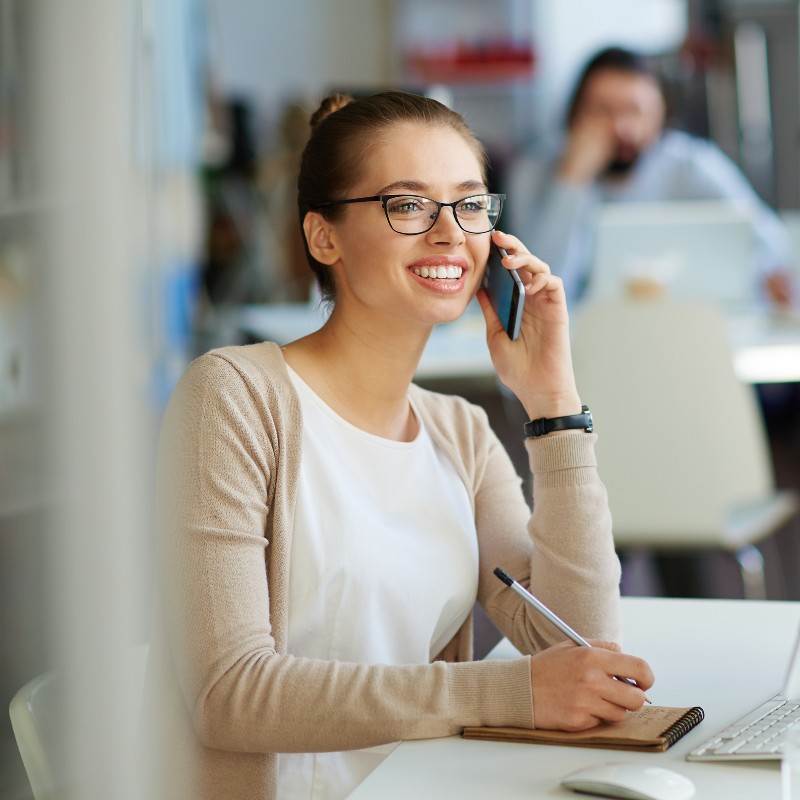 Lady on the phone in an office