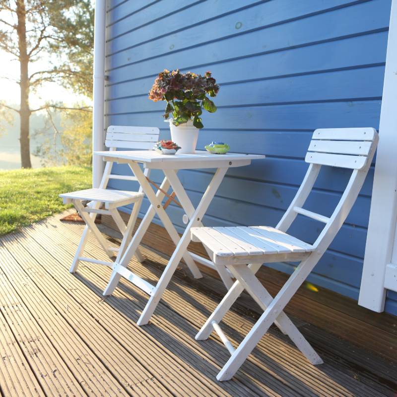 two deck chairs outside holiday home
