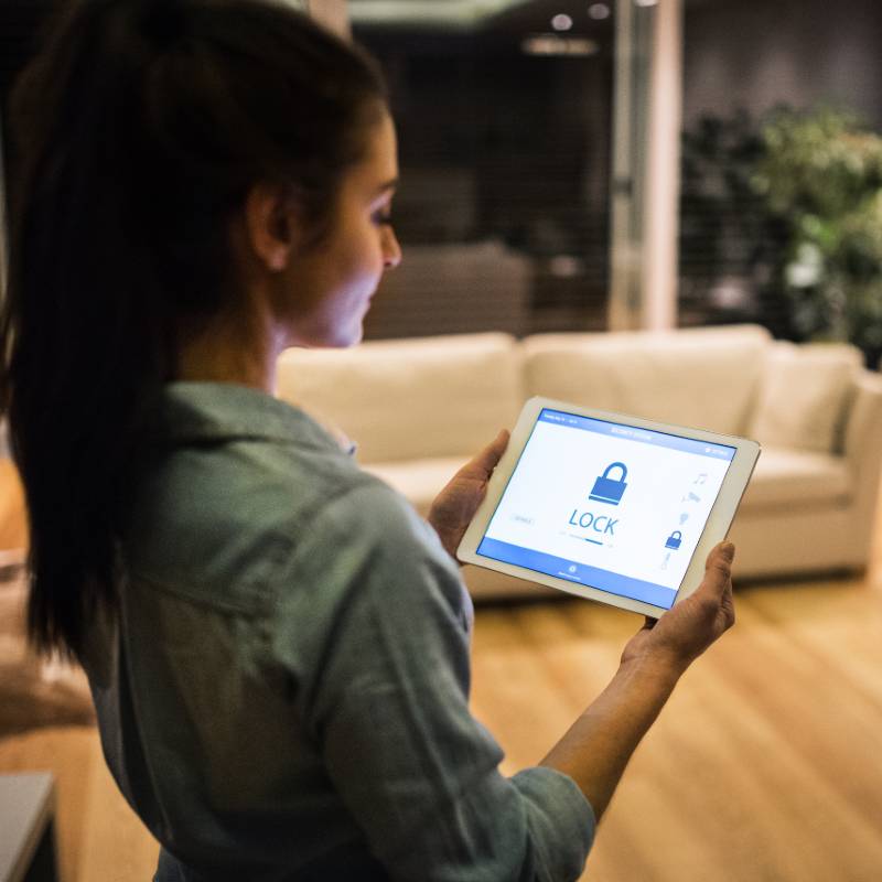 woman on home security laptop screen