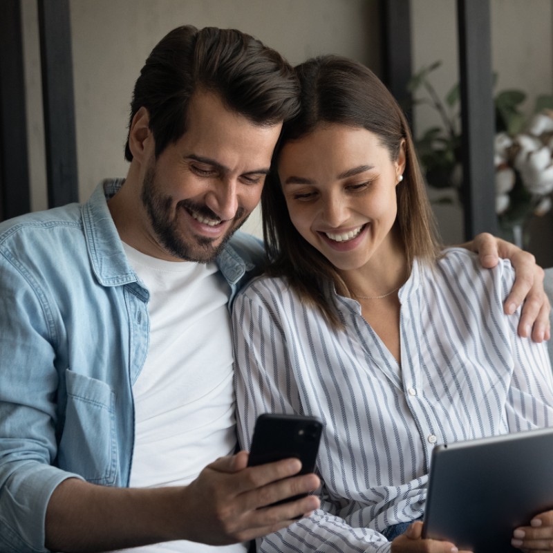 couple at home on phone