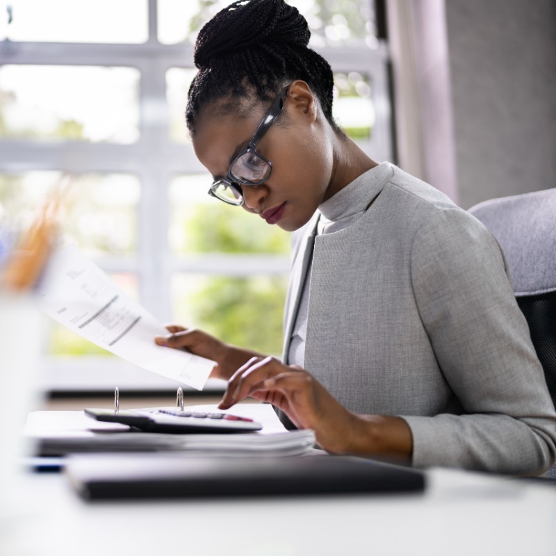 woman in office doing accounts