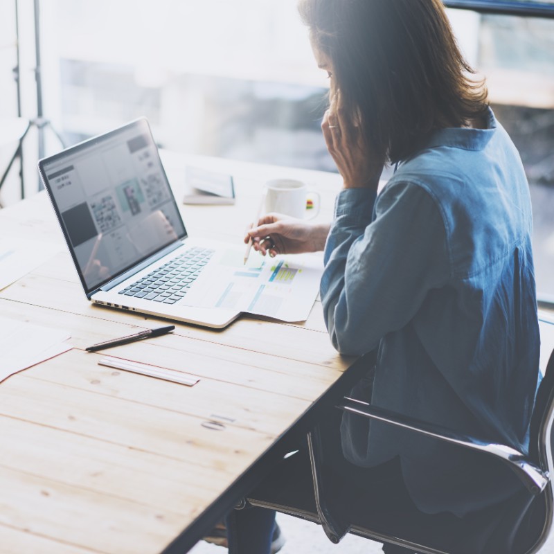 woman in office on laptop