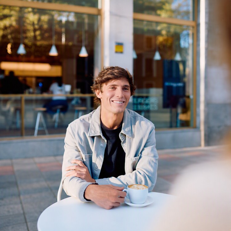 Young man having coffee